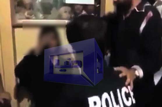 Disturbing video shows policeman violently beating woman in front of her child