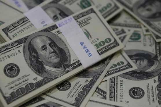 Dollar up on Fed's rate hint, Yen boosted by Japan data