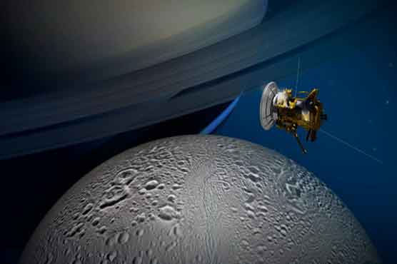 NASA spacecraft plunges through Saturn moon's icy spray