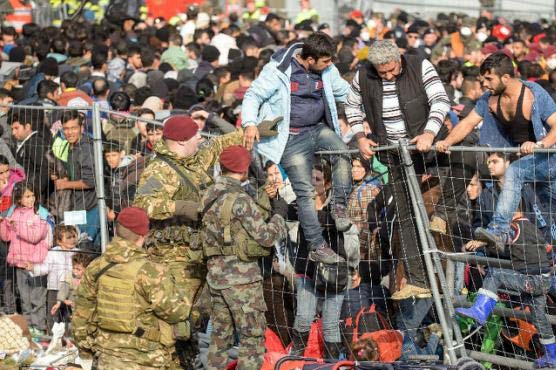 Germany to funnel refugee flow as 17 children die at sea