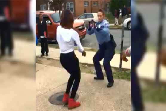 Show me your hands, or moves, dancing officer says to teens