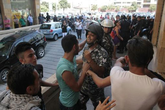 Lebanon police ejecting protesters from ministry: security