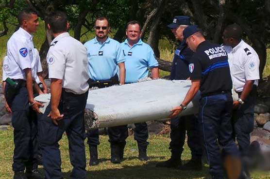 France confirms wing part found on Reunion is from MH370 