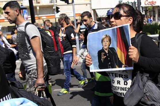 Merkel says Germany can cope with refugees without raising taxes