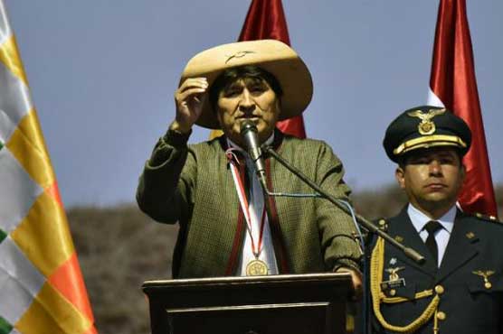 Bolivians warned to tighten belts because of oil plunge