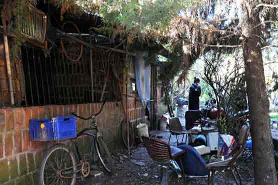 Argentine accused of keeping wife, autistic son in cage