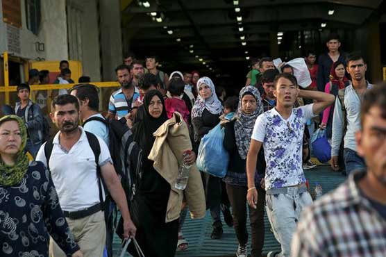 Greece's Lesbos 'near explosion' with over 15,000 refugees: minister 