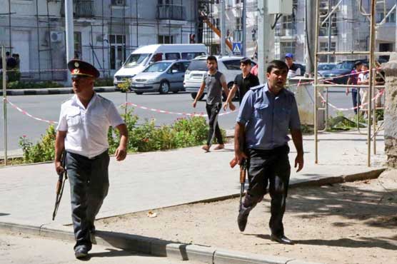 Rebel Tajik general on treason charge after street battles