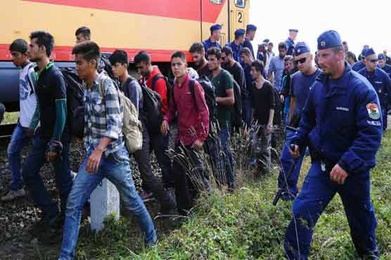 EU unveils 'bold' plan to share 160,000 refugees