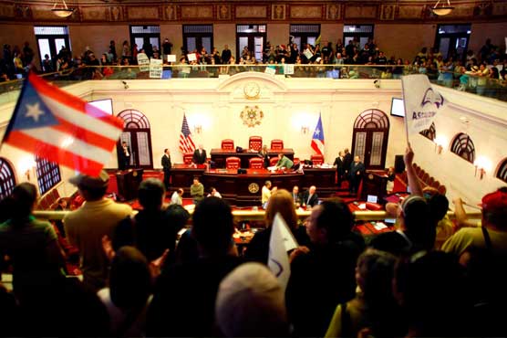 Puerto Rico unveils austerity, reform plan to slash debt 