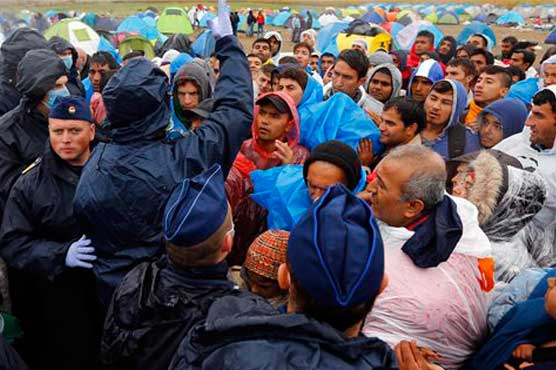 Romania opposed to EU migrant quotas: president