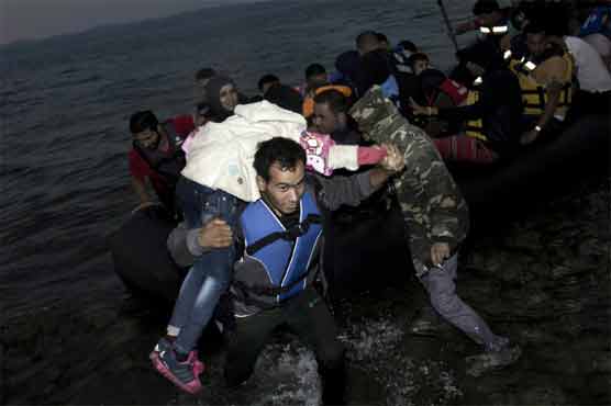 Germany pushes divided EU on migrant quota plan 