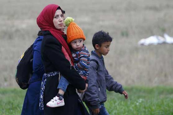 Hungary PM slams migrant 'rebellion', U.N. warns of millions more refugees