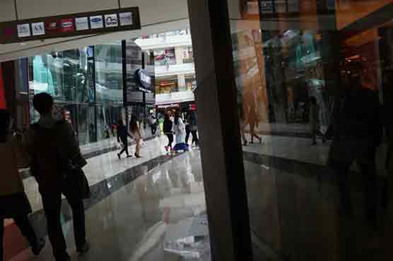 World on edge as Fed weighs rate increase 