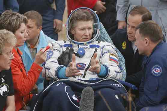 Kazakhstan greets record-setting Russian cosmonaut, two crewmen