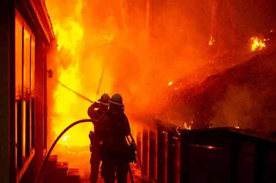 Wildfires wreak havoc across northern California, killing one