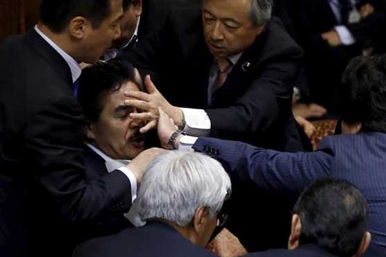 Japan opposition tries to halt vote on contentious security bills