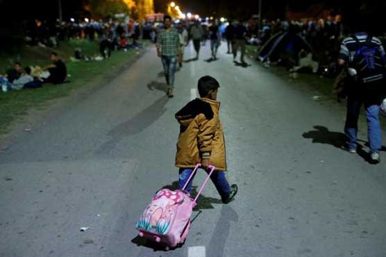 Croatia overwhelmed by flood of migrants, EU calls summit