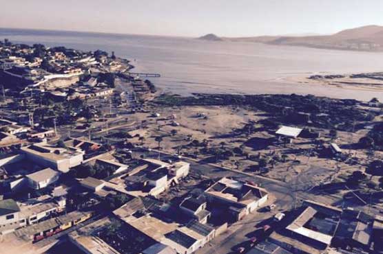 Chileans pick through debris after powerful quake; 11 dead