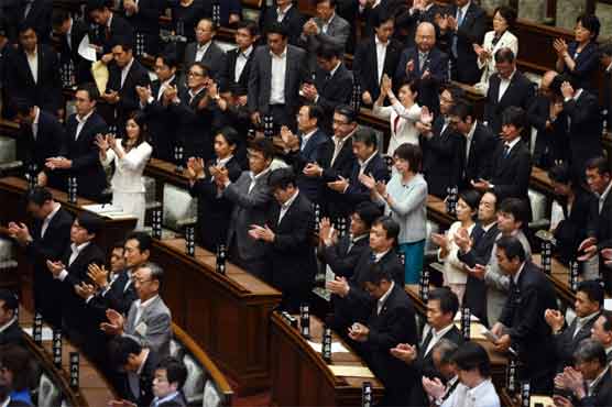 Opponents vow to fight laws expanding role of Japan's military 