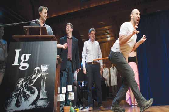 Studies on kissing, the word 'huh?' among Ig Nobel award winners