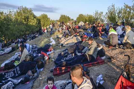 EU official sees aid to keep migrants in Turkey