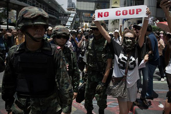 Thai anti-coup activists defy junta ban on protests 