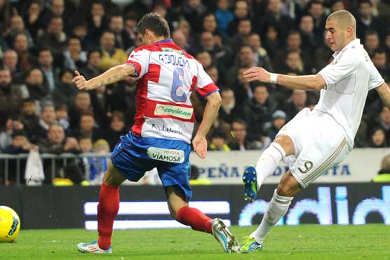 Football: Benzema goal edges Real Madrid past Granada