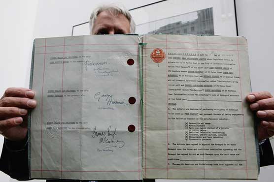 First Beatles contract sold at US auction