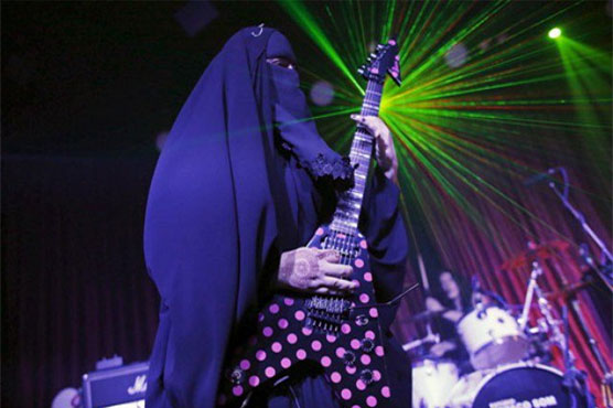 Gisele Marie, a Muslim woman and professional heavy metal musician
