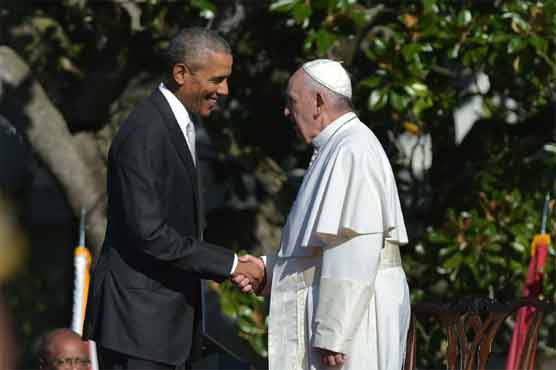 Obama, pope unite for action on migrants, climate