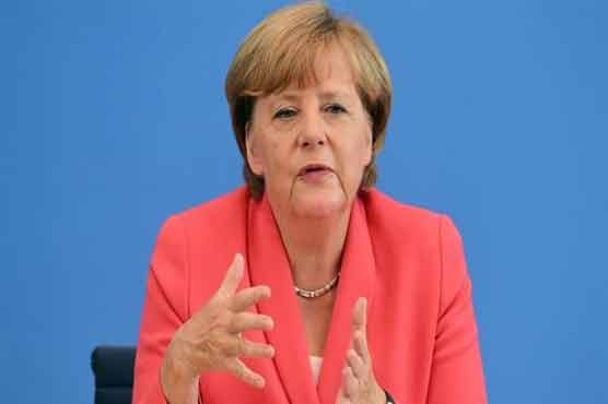Merkel says Assad must be involved in Syria talks