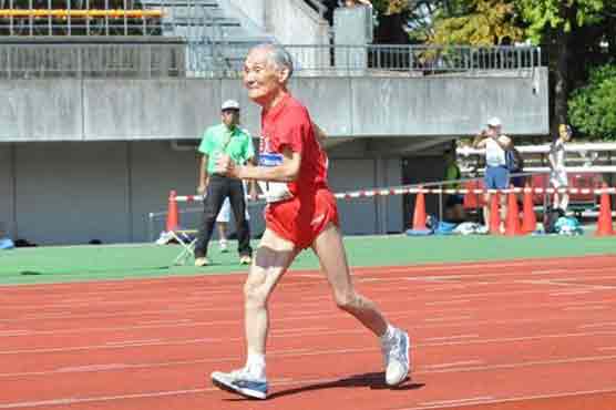 Japan's 105-yr-old 'Golden Bolt' sets sprint record, misses personal best