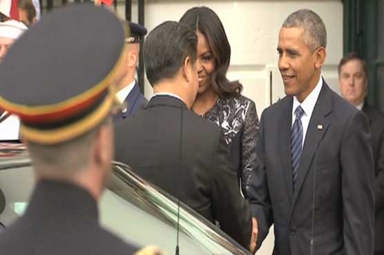 Obama, Xi vow for climate but clash on rights, islands