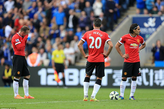 Football: Man City slip allows Man Utd to claim summit