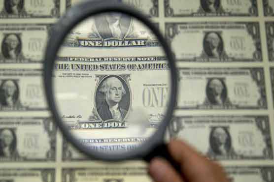 Dollar rises on rate hike talk, Shanghai bounces