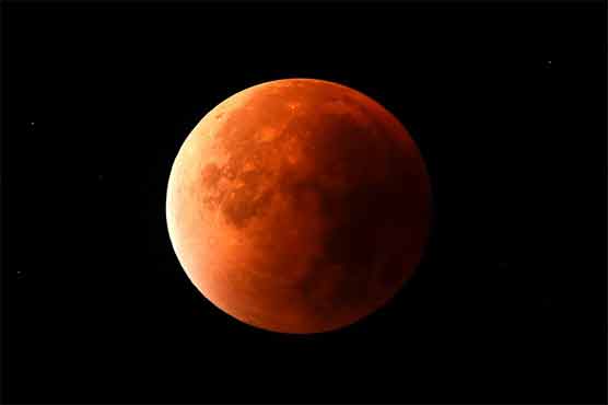 'Super blood moon' shines bright across the world