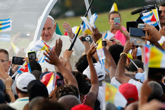 Pope flies home after rapturous welcome in Cuba, US