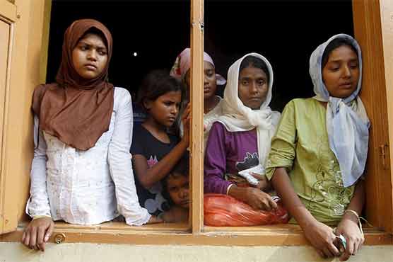 Indonesia probes alleged attack on migrant Rohingya women