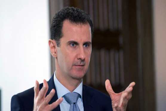 Syria's Assad says willing to hold early presidential vote
