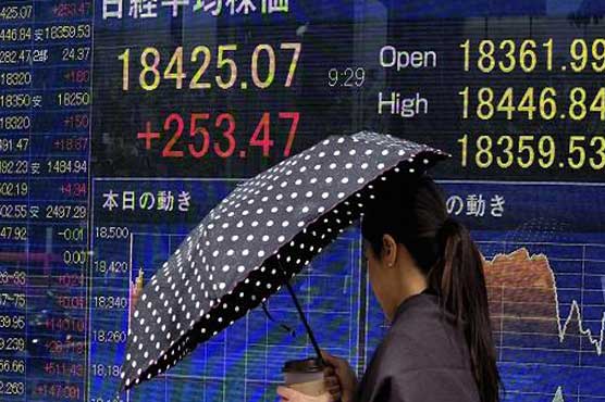 Tokyo stocks tumble by break after weak BoJ corporate confidence survey