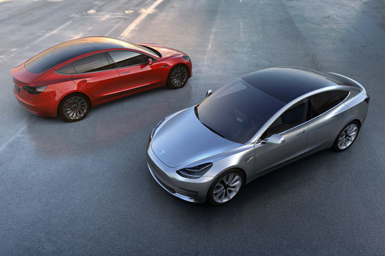 Tesla unveils cheaper model aimed at mass market