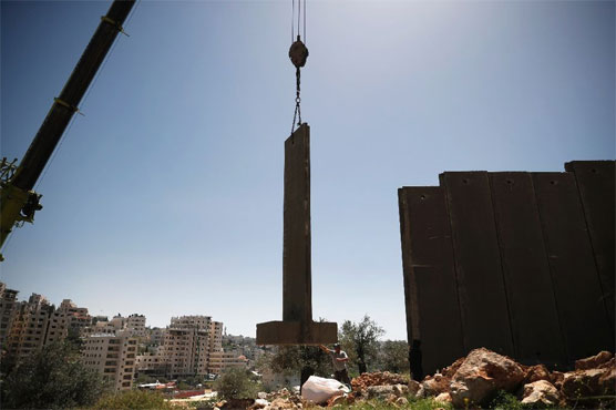 Israel starts building new part of controversial West Bank wall