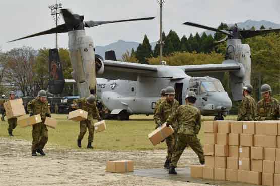 Japan battles to care for 100,000 evacuees after quake