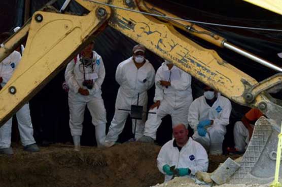 Mexico police, mayor arrested over 10 burned bodies