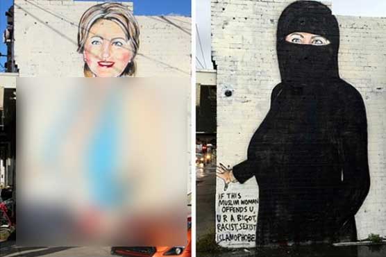 Clinton mural painted over after bikini and niqab fail to fit