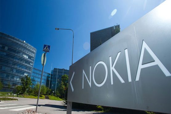 Nokia to cut deeper as merger spills red ink