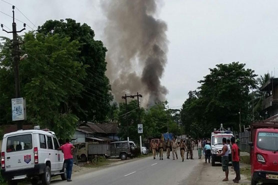 Gunmen kill 12 in attack on market in northeast India