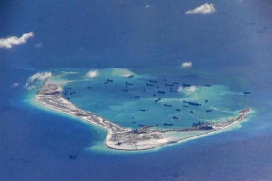 China conducts 'combat patrols' over contested islands