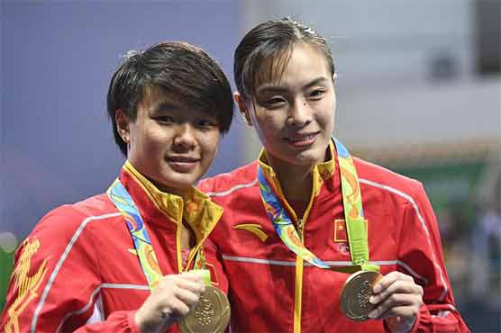 Olympics: China's Wu wins record fifth diving gold